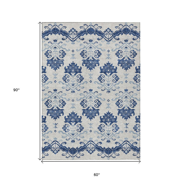 Homeroots 3' Stylish Beige Tan And Taupe Oriental Washable Area Rug For Indoor And Outdoor Spaces, Durable Design 5' X 8' Polyester 585443