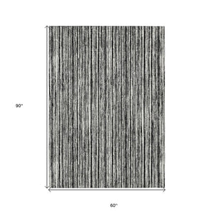 HomeRoots 5' Black and Ivory Striped Area Rug - Durable, Washable Design for Indoor and Outdoor Spaces 5' X 8' 585467