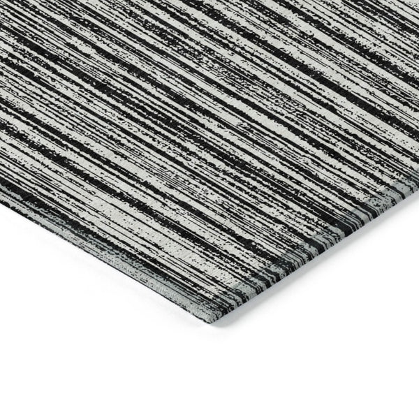 HomeRoots 5' Black and Ivory Striped Area Rug - Durable, Washable Design for Indoor and Outdoor Spaces 5' X 8' 585467