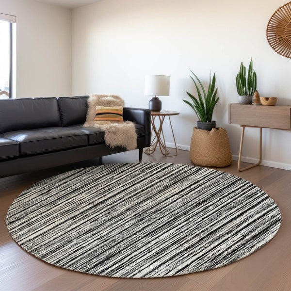 HomeRoots 5' Black and Ivory Striped Area Rug - Durable, Washable Design for Indoor and Outdoor Spaces 8' Round 585468