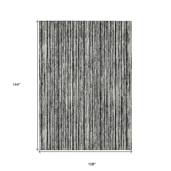 HomeRoots 9' Black and Ivory Striped Area Rug - Stylish, Washable Indoor/Outdoor Design for Any Space 9' X 12' 585470