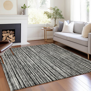 HomeRoots 9' Black and Ivory Striped Area Rug - Stylish, Washable Indoor/Outdoor Design for Any Space 9' X 12' 585470