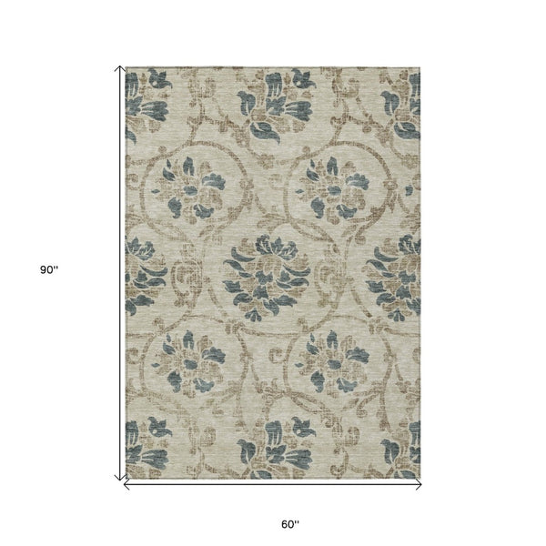 HomeRoots 5' Durable Floral Area Rug in Beige, Tan & Blue - Washable for Indoor & Outdoor Use, Easy Care 5' X 8' 585605