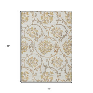 HomeRoots 5' Elegant Ivory and Gold Floral Area Rug - Durable, Washable Design for Indoor and Outdoor Use 5' X 8' 585641