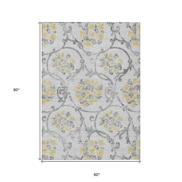 HomeRoots 5' Silver Gray and Gold Floral Area Rug - Elegant, Washable, Indoor/Outdoor Design for Any Space 5' X 8' 585665