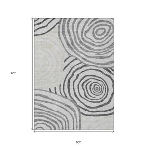 Homeroots 3' Beige Taupe And Green Abstract Washable Area Rug For Indoor And Outdoor High-traffic Spaces 5' X 8' Polyester 585869