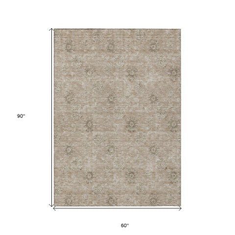 Homeroots 3' Gold Floral Washable Area Rug - Durable Indoor Outdoor Accent For Living Room, Patio & More 5' X 8' Polyester 586997