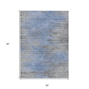 Homeroots 3' Denim Blue Abstract Washable Indoor Outdoor Area Rug - Stylish, Durable, And Easy To Maintain 5' X 8' Polyester 587159
