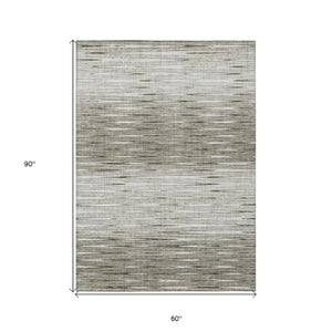 Homeroots 3' Artichoke Green Abstract Washable Area Rug - Ideal For Indoor And Outdoor Spaces, Stain Resistant 5' X 8' Polyester 587429