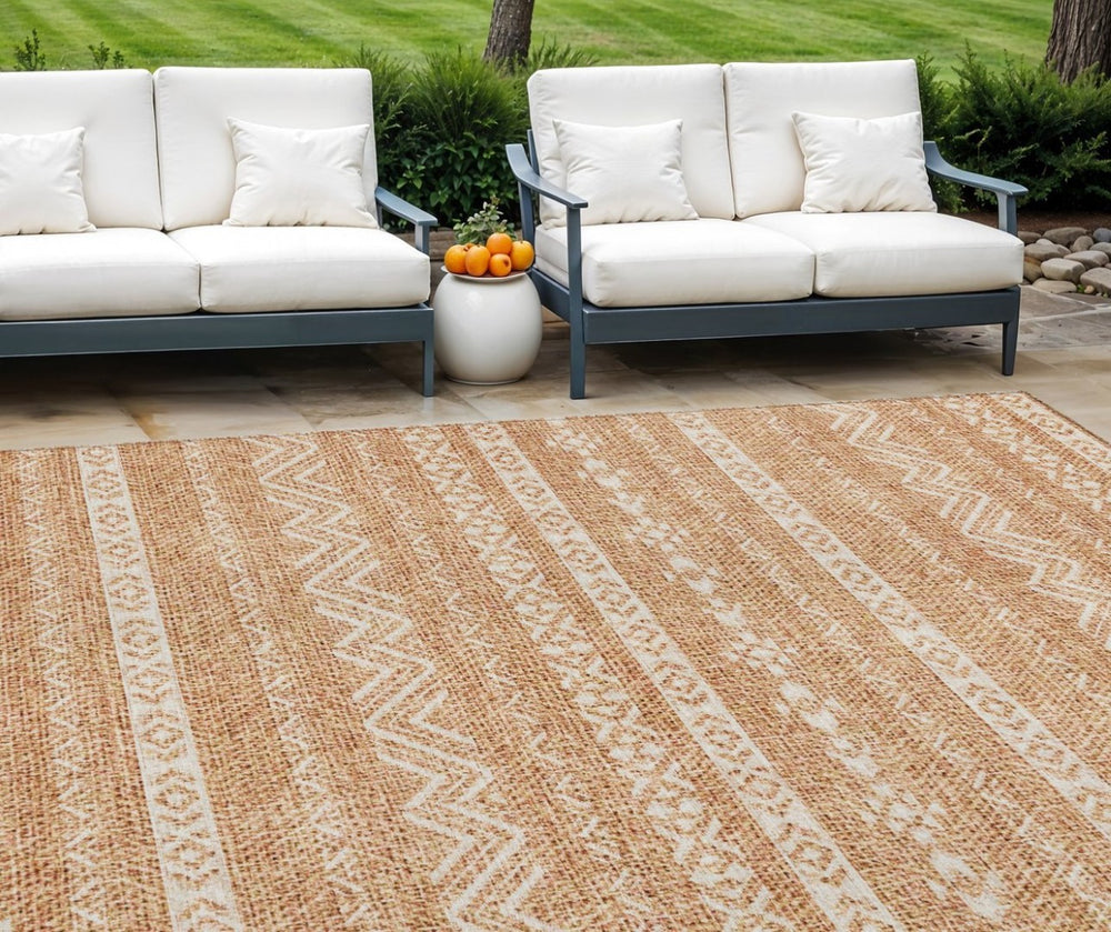 HomeRoots 9' Terra Cotta and Beige Southwestern Area Rug - Durable, Washable, Indoor/Outdoor Versatile Style 9' X 12' 587570