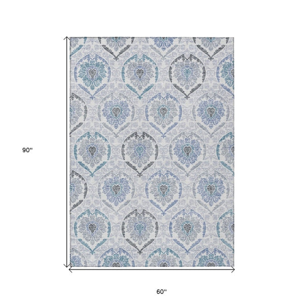 HomeRoots 5' Timeless Gray and Denim Blue Medallion Washable Area Rug for Indoor and Outdoor Spaces 5' X 8' 587657
