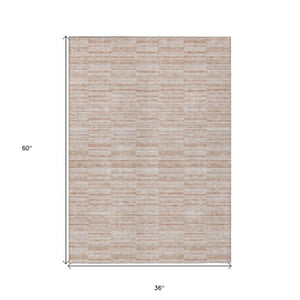 Homeroots 3' Blush Pink And Beige Striped Washable Area Rug - Stylish Indoor Outdoor Decor For Any Space 3' X 5' Polyester 587968
