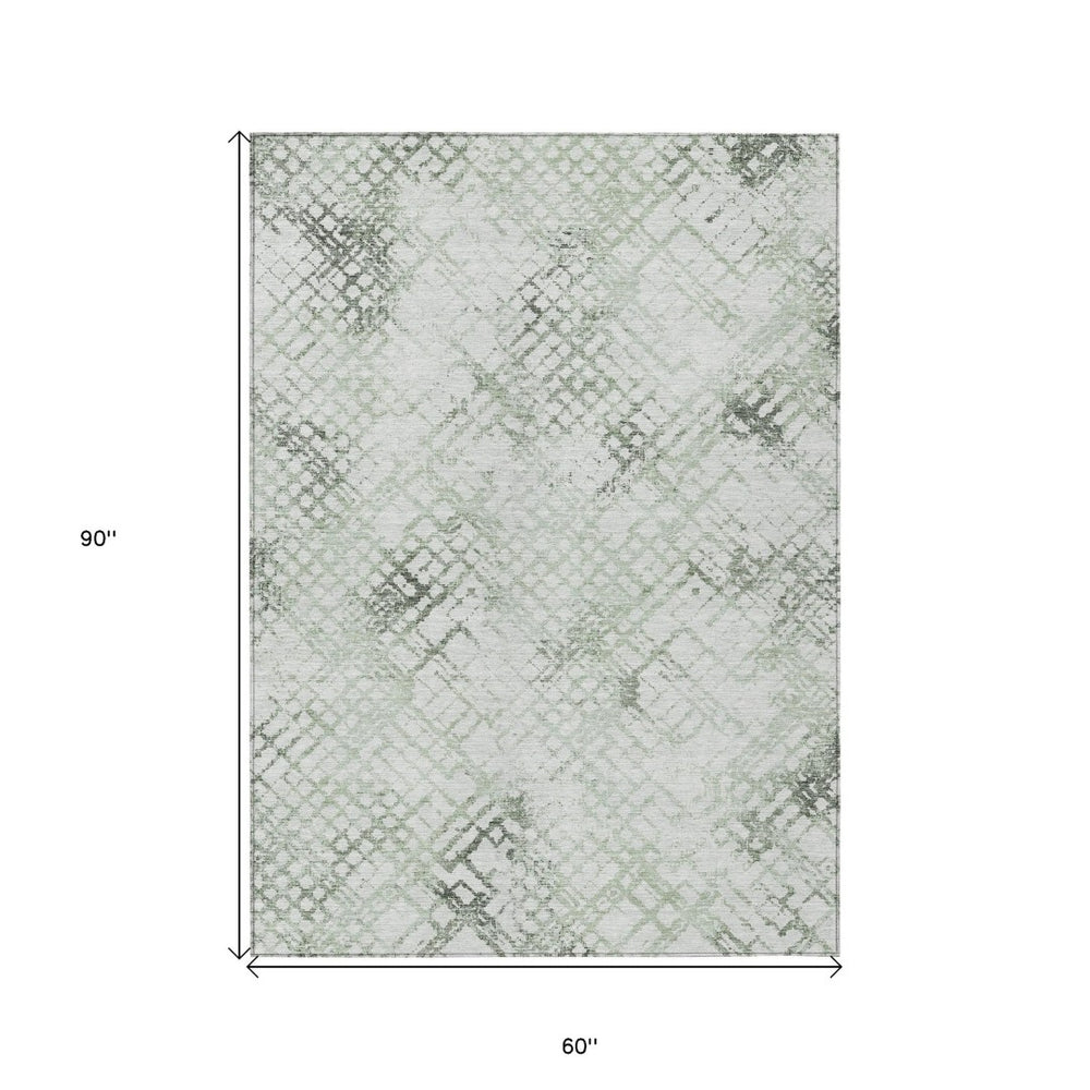 HomeRoots 5' Artichoke Green and Ivory Geometric Area Rug - Washable, Durable, Stylish for Indoor & Outdoor Use 5' X 8' 588263