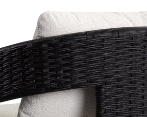 Sunpan Pylos Dining Armchair - Stylish Outdoor Seating with Durable Wicker and Soft Performance Fabric Cushion Black / Louis Cream