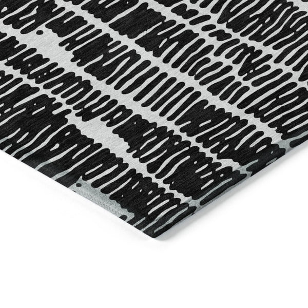 HomeRoots 9' Modern Black and Ivory Abstract Area Rug for Indoor and Outdoor Use - Stain-Resistant & Washable! 9' X 12' 588496