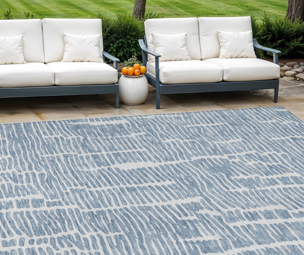 HomeRoots 9' Blue and Ivory Abstract Area Rug - Durable, Washable Design for Indoor & Outdoor Spaces 9' X 12' 588508