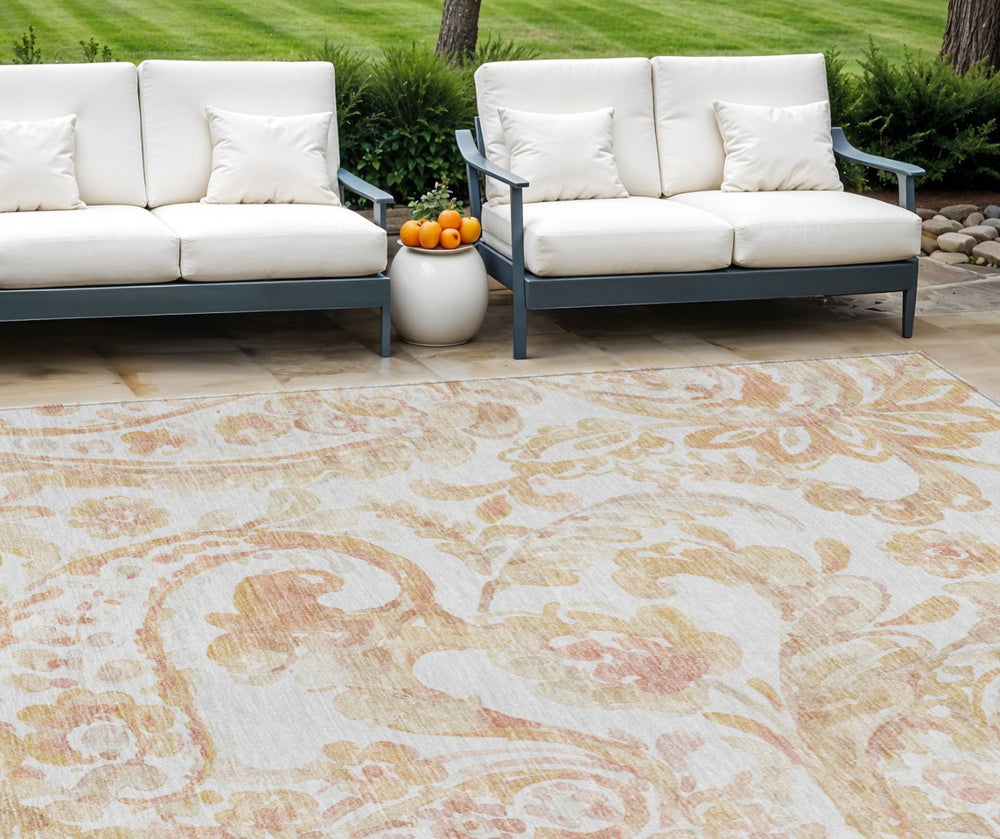 HomeRoots 5' Coral Ivory Peach Paisley Area Rug - Stylish, Durable, Washable for Indoor & Outdoor Spaces 10' X 14' 588647