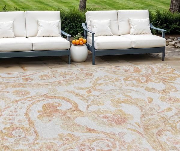 HomeRoots 5' Coral Ivory Peach Paisley Area Rug - Stylish, Durable, Washable for Indoor & Outdoor Spaces 10' X 14' 588647