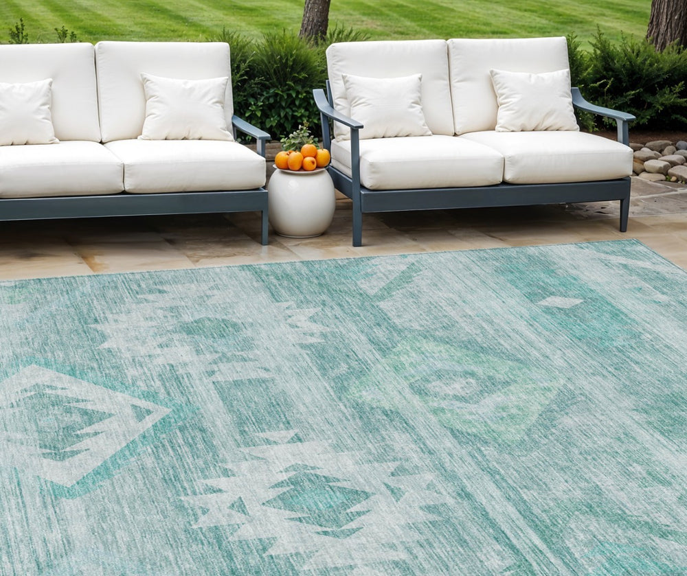 HomeRoots 9' Vibrant Aqua Turquoise and Ivory Southwestern Indoor Outdoor Area Rug for Stylish Spaces 9' X 12' 588688