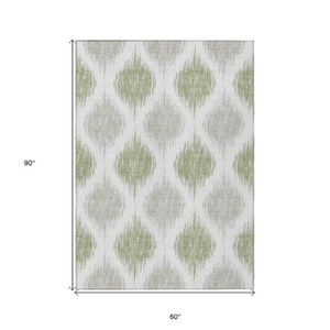 Homeroots 3' Stylish Artichoke Green Ivory Gray Ikat Washable Area Rug For Indoor Outdoor Spaces, Durable Design 5' X 8' Polyester 589063