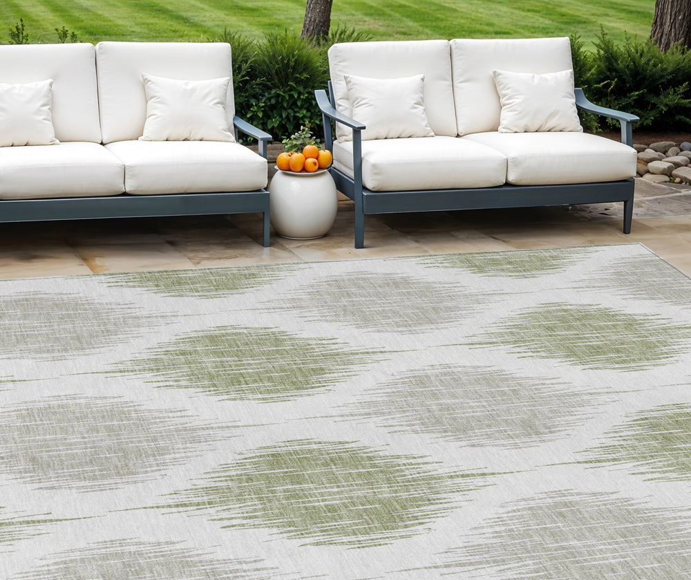 Homeroots 3' Stylish Artichoke Green Ivory Gray Ikat Washable Area Rug For Indoor Outdoor Spaces, Durable Design 10' X 14' Polyester 589067