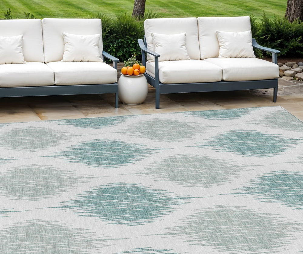 HomeRoots 5' Aqua Teal Blue and Ivory Ikat Area Rug - Stylish, Washable, Durable for Indoor or Outdoor Spaces 10' X 14' 589073