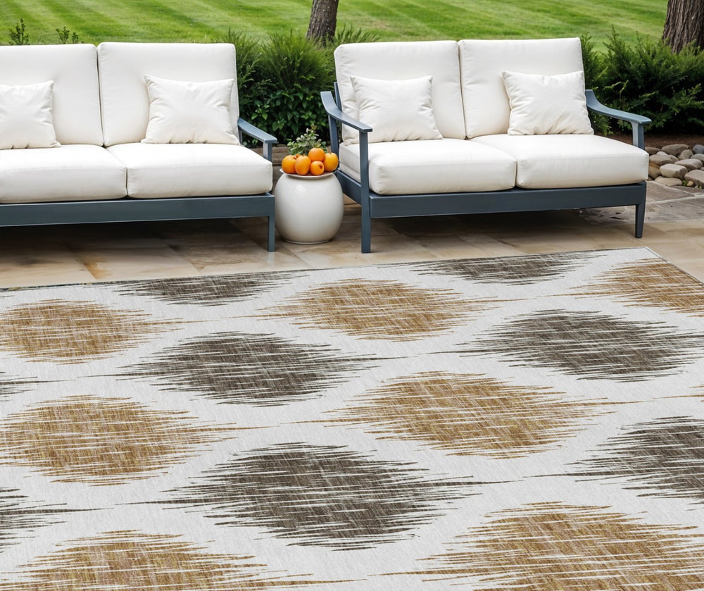 HomeRoots 9' Chocolate and Ivory Ikat Area Rug - Stylish, Durable, Washable Design for Indoor and Outdoor Spaces 9' X 12' 589090