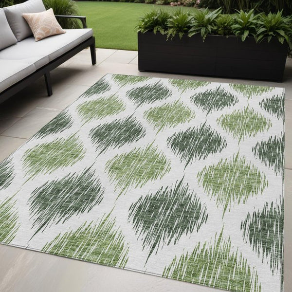 Homeroots 3' Stylish Artichoke Green Ivory Gray Ikat Washable Area Rug For Indoor Outdoor Spaces, Durable Design 5' X 8' Polyester 589093
