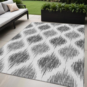 Homeroots 3' Stylish Artichoke Green Ivory Gray Ikat Washable Area Rug For Indoor Outdoor Spaces, Durable Design 5' X 8' Polyester 589105