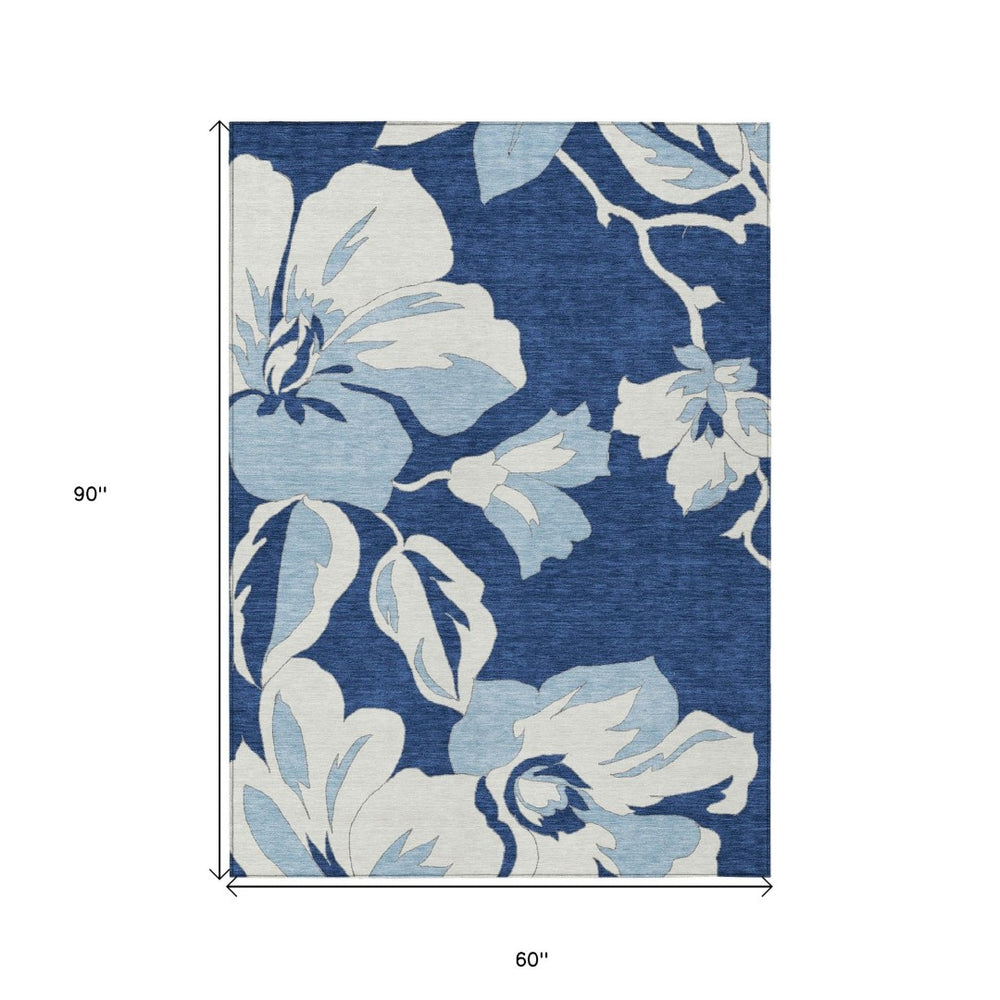 HomeRoots 5' Navy Blue Floral Washable Area Rug for Indoor & Outdoor Spaces - Durable & Easy-Care Design 5' X 8' 589555