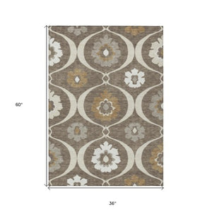 Homeroots 3' Black Ivory And Taupe Medallion Washable Area Rug For Indoor And Outdoor Spaces, Durable Design 3' X 5' Polyester 589596