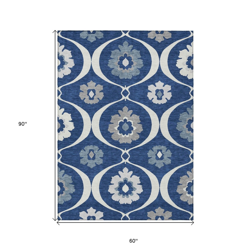 HomeRoots 5' Navy Blue and Ivory Medallion Area Rug - Washable, Stylish, Durable for Indoor and Outdoor Use 5' X 8' 589627