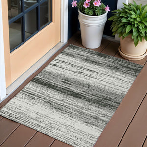 Homeroots 3' Black Ivory And Gray Striped Indoor Outdoor Area Rug - Stylish, Washable, And Stain Resistant! 3' X 5' Polyester 589656