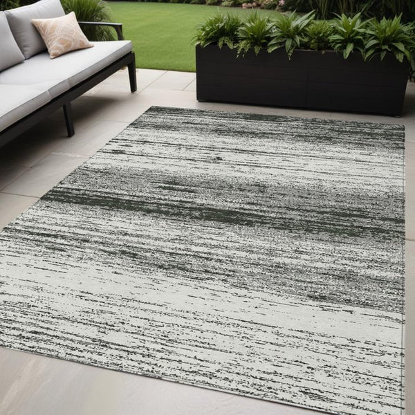 Homeroots 3' Black Ivory And Gray Striped Indoor Outdoor Area Rug - Stylish, Washable, And Stain Resistant! 5' X 8' Polyester 589657
