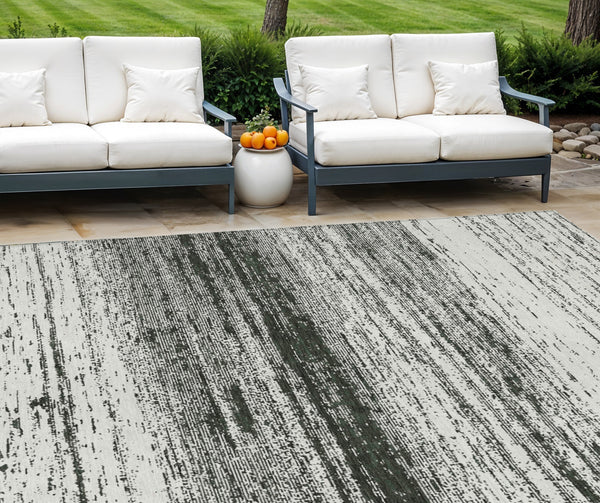 Homeroots 3' Black Ivory And Gray Striped Indoor Outdoor Area Rug - Stylish, Washable, And Stain Resistant! 8' X 10' Polyester 589659