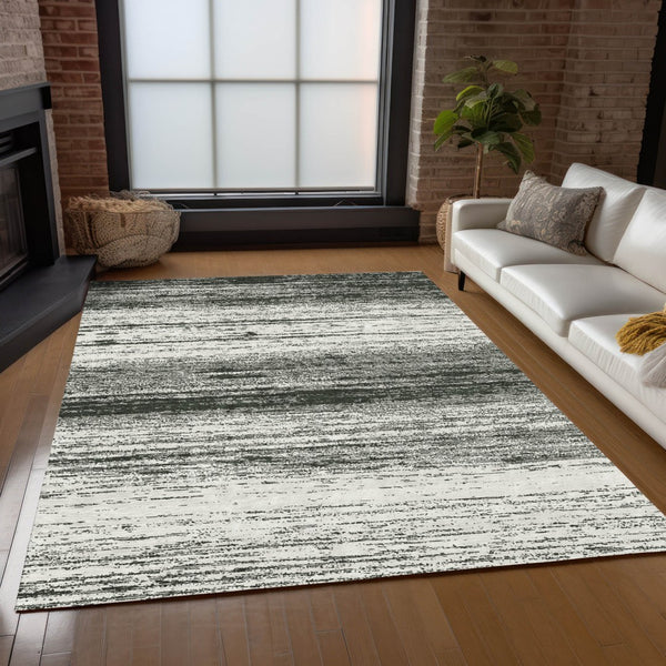 Homeroots 3' Black Ivory And Gray Striped Indoor Outdoor Area Rug - Stylish, Washable, And Stain Resistant! 9' X 12' Polyester 589660