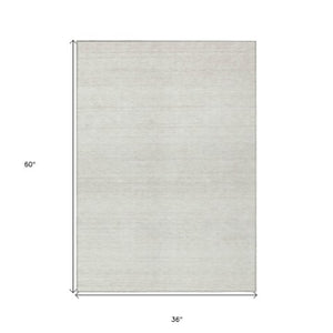 Homeroots 3' Black Ivory And Gray Striped Indoor Outdoor Area Rug - Stylish, Washable, And Stain Resistant! 3' X 5' Polyester 589686