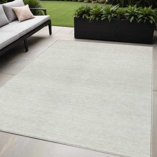 Homeroots 3' Black Ivory And Gray Striped Indoor Outdoor Area Rug - Stylish, Washable, And Stain Resistant! 5' X 8' Polyester 589687