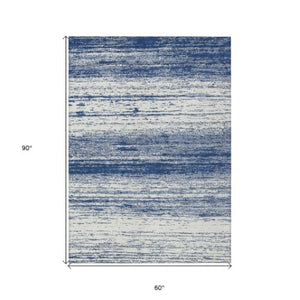 Homeroots 3' Black Ivory And Gray Striped Indoor Outdoor Area Rug - Stylish, Washable, And Stain Resistant! 5' X 8' Polyester 589705