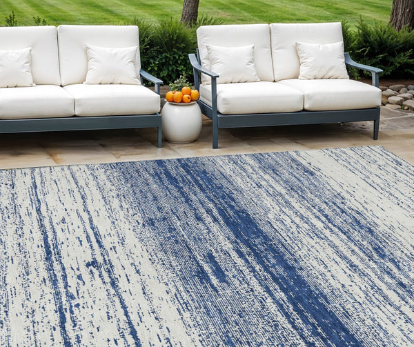 Homeroots 3' Black Ivory And Gray Striped Indoor Outdoor Area Rug - Stylish, Washable, And Stain Resistant! 8' X 10' Polyester 589707