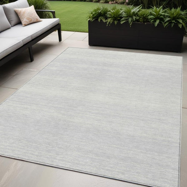 Homeroots 3' Black Ivory And Gray Striped Indoor Outdoor Area Rug - Stylish, Washable, And Stain Resistant! 5' X 8' Polyester 589729
