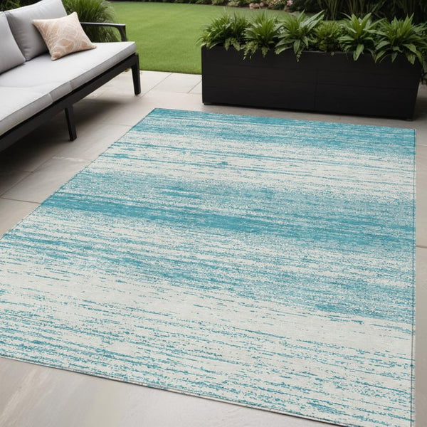 Homeroots 3' Black Ivory And Gray Striped Indoor Outdoor Area Rug - Stylish, Washable, And Stain Resistant! 5' X 8' Polyester 589735