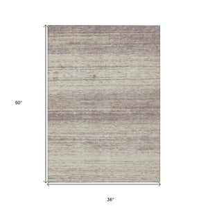 Homeroots 3' Black Ivory And Gray Striped Indoor Outdoor Area Rug - Stylish, Washable, And Stain Resistant! 3' X 5' Polyester 589740