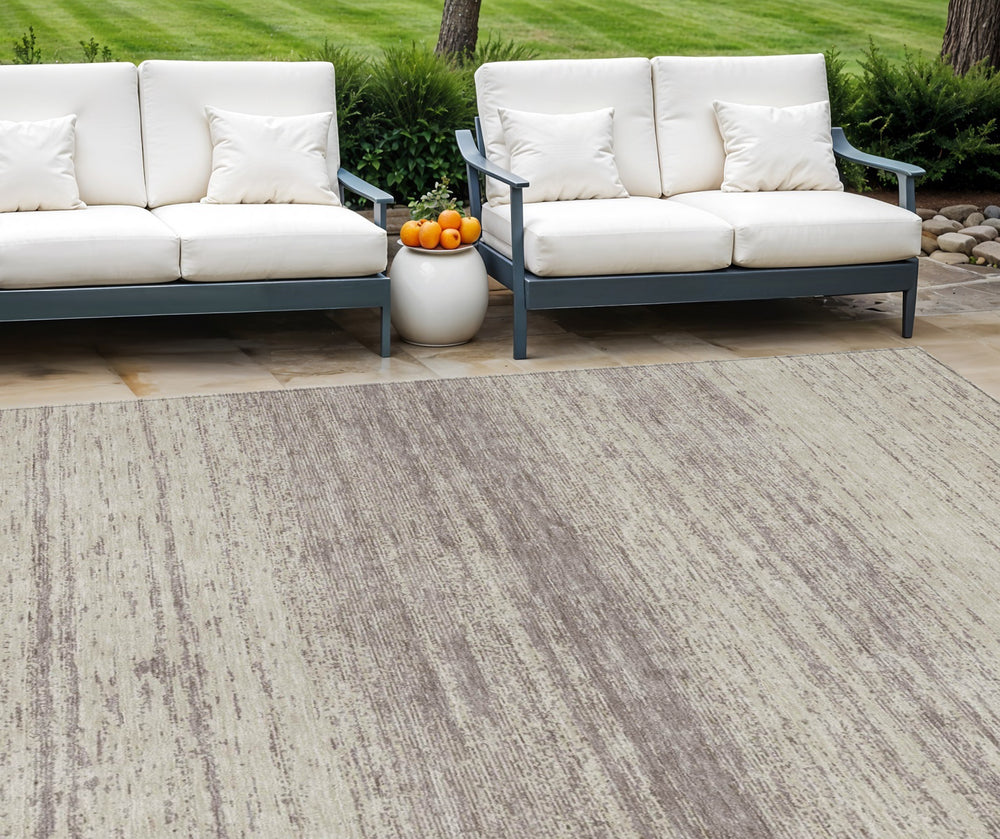 Homeroots 3' Black Ivory And Gray Striped Indoor Outdoor Area Rug - Stylish, Washable, And Stain Resistant! 10' X 14' Polyester 589745