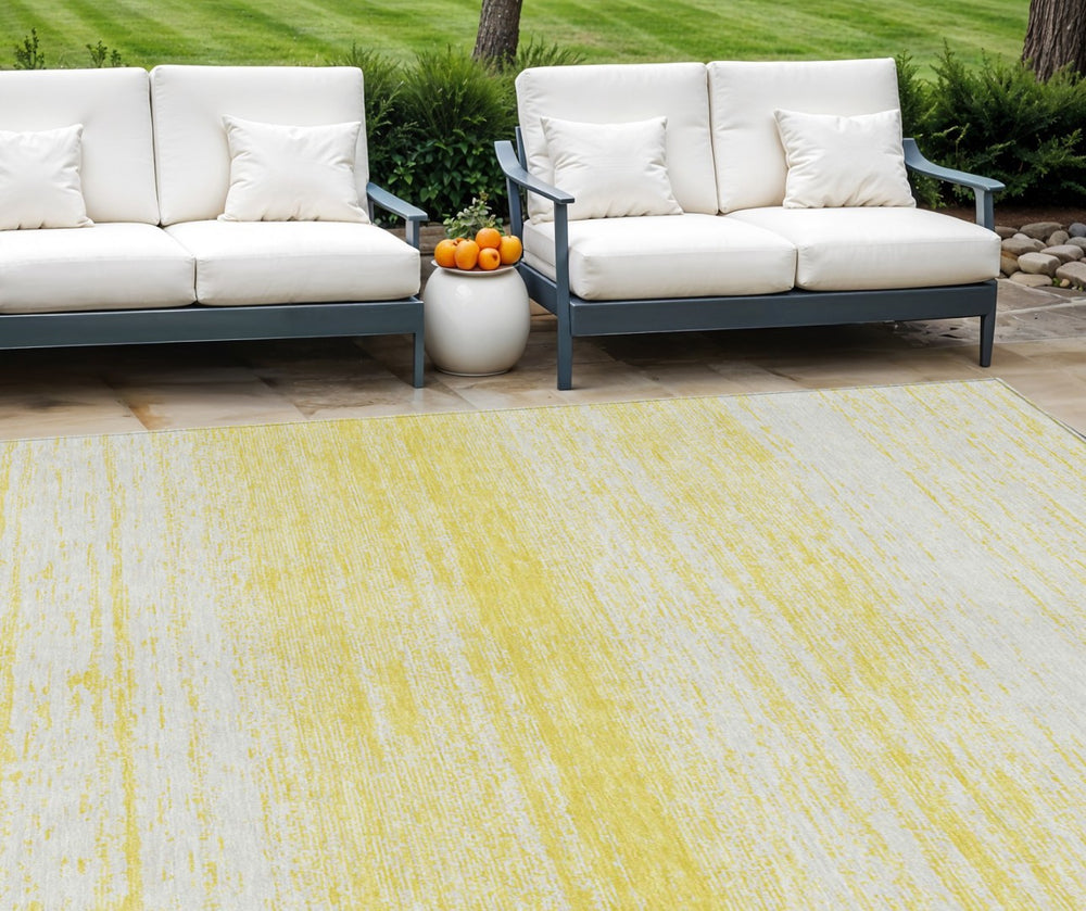 HomeRoots 9' Yellow and Ivory Striped Washable Area Rug - Durable Indoor Outdoor Style for High-Traffic Spaces 9' X 12' 589750