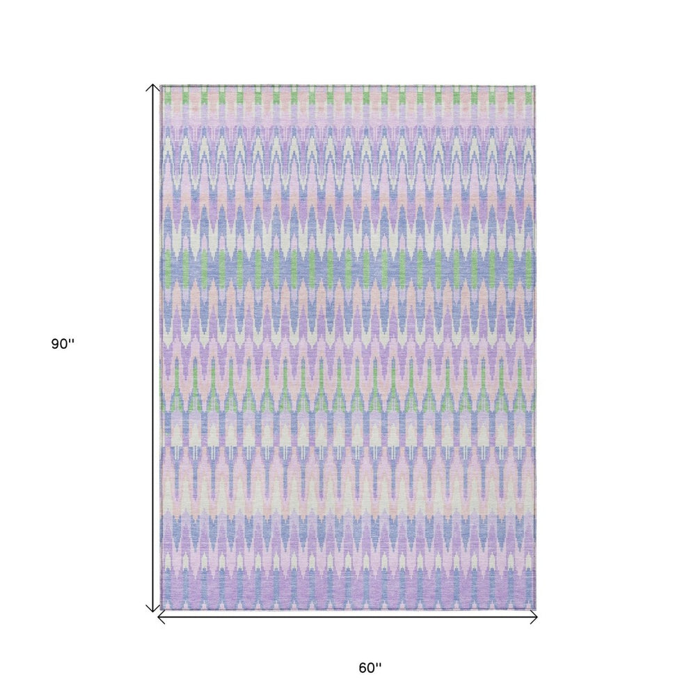 HomeRoots 5' Southwestern Washable Area Rug in Lavender Pink & Lime Green for Indoor & Outdoor Spaces 5' X 8' 589801