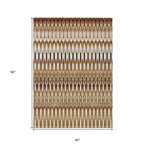 Homeroots 3' Beige Taupe And Gold Southwestern Indoor Outdoor Area Rug - Durable, Washable, Stylish Decor 5' X 8' Polyester 589837