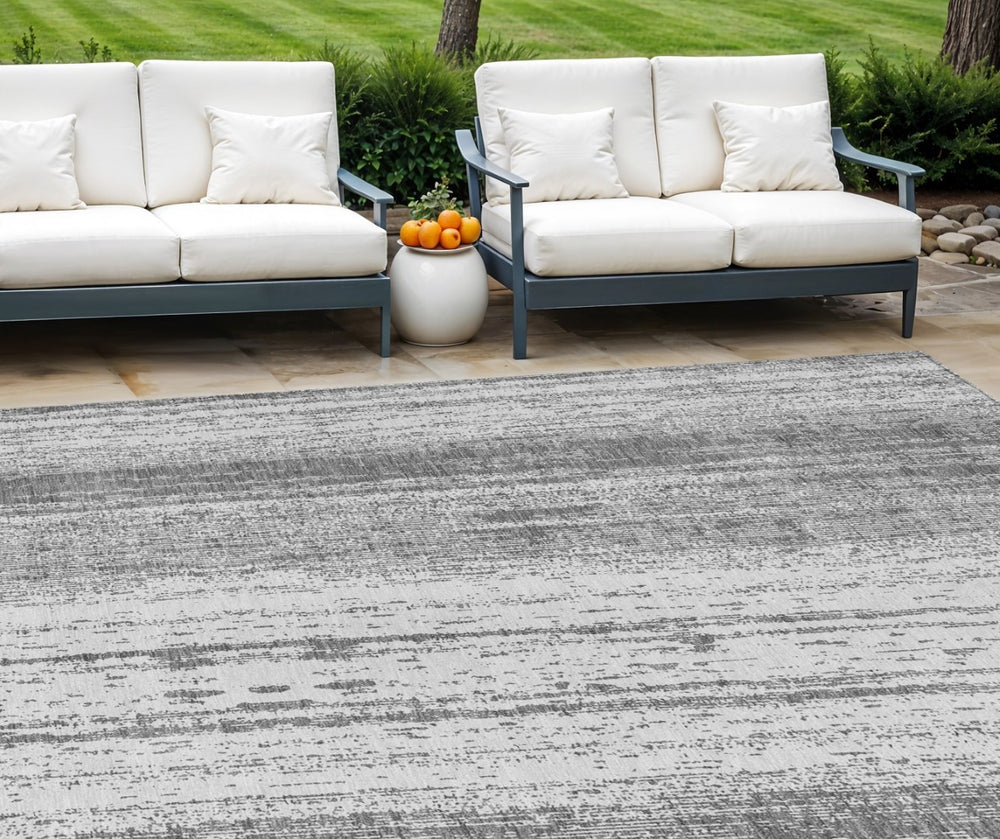 HomeRoots 9' Gray and Ivory Striped Area Rug - Versatile Indoor Outdoor Design for High-Traffic Spaces 9' X 12' 589876