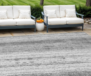 HomeRoots 9' Gray and Ivory Striped Area Rug - Versatile Indoor Outdoor Design for High-Traffic Spaces 9' X 12' 589876