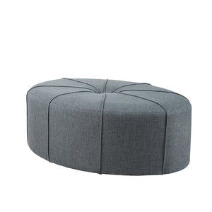 JLA Home Madison Park - Oval Oversized Ottoman in Charcoal Flannel — Tufted Button, Thick Welting, No Assembly, Versatile Seating Surface MP101-0199